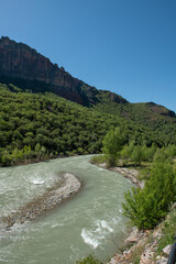 Munzur stream. Munzur river rafting trails. Munzur Stream nature park. Green Munzur valley.
