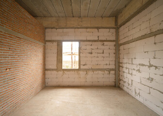 Under construction home or house with scaffolding on site in village. Old unfurnished rental property, living space units. lifestyle. Renovation.