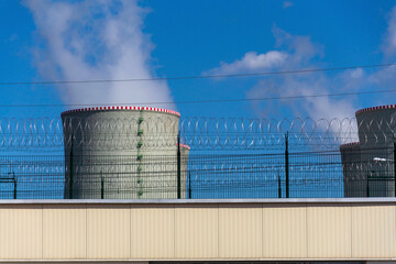 Cooling towers at nuclear power plant, energy self-sufficiency, greenhouse emission reduction and...