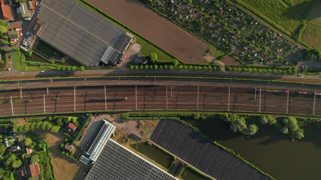 Above View Of Railway Tracks Over Train Station In The City Of Barendrecht, Netherlands. Aerial Shot