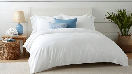 Serene and Relaxing Coastal Inspired Bedroom with Soft Blue Accents White Bedding and Elegant Beach Themed Decor Elements Creating a Calming and Inviting Atmosphere