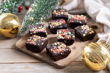 Christmas brownie on wooden table