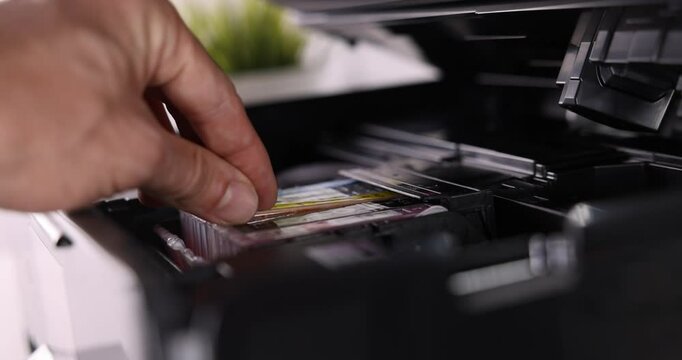 office equipment maintenance and service - hand replace inkjet printer cartridge