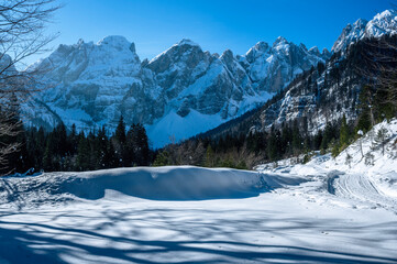 Julian Alps immersed in snow. Riofreddo Valley, wild and magical