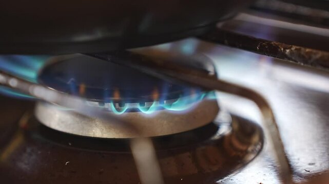 An electric lighter ignites the gas in the kitchen stove. economical fuel for cooking and heating the home.