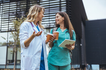 Friendly Medical Professionals Enjoying a Coffee Break Outside