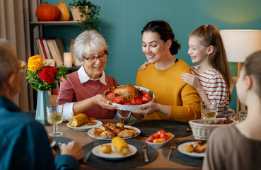 Family celebrating Thanksgiving Day