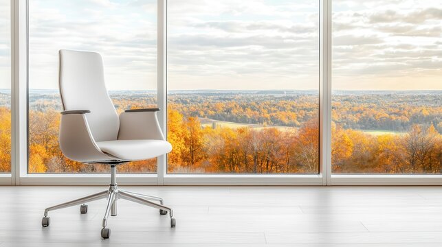 Enhance your workspace with a modern office chair overlooking nature's autumn beauty