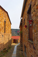 Charming Portuguese village with traditional stone houses and terracotta roofs. Peaceful atmosphere,  perfect for an eco-retreat or a countryside escape. Remote village setting. Responsible travel. 
