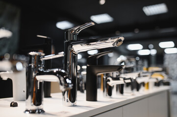 Rows of new faucets in plumbing shop