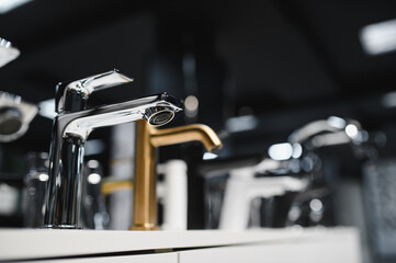 Rows of new faucets in plumbing shop