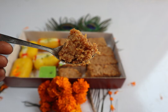 Cham cham and milkcake (kalakand), traditional Indian sweets, served together on a tray, perfect for festive celebrations and special occasions, adding sweetness to gatherings. Selective focus 