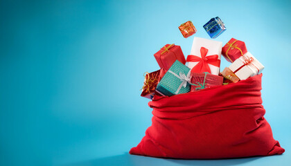Santa's red sack filled with colorful Christmas gifts