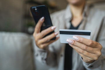 Adult woman use smart phone for online shopping transaction safely