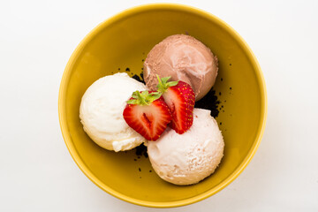 Strawberry fresh ice cream on white background. Scoops of strawberry ice cream with fresh fruit
