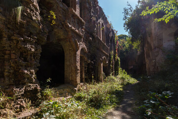Fototapeta premium Remains of buildings made with brick on old fortress territory