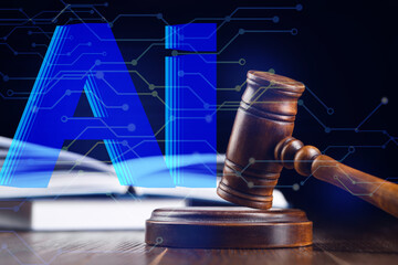Artificial intelligence and law. Judge's gavel on table and AI abbreviation