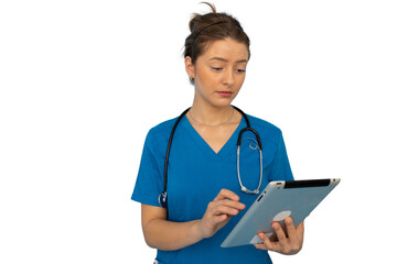 Young nurse in scrubs efficiently using a tablet for patient care