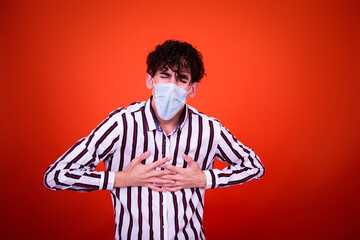 Attractive student with curly hair and a cold.