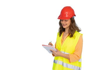 Ambitious young woman in hard hat focused on her work