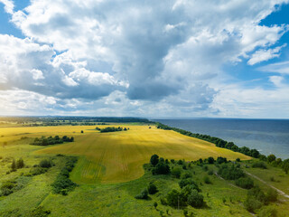 Aerial view of calm and wild Saka beach with a clear blue water on a cloudy summer day. Beautiful...