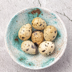 Obraz premium Easter quail eggs. Spring background with small easter quail eggs. Vintage photo processing