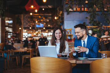 Two Professionals Networking Over Coffee in a Cozy Cafe Setting