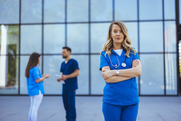 Confident Medical Professional Standing Outside Modern Hospital Building