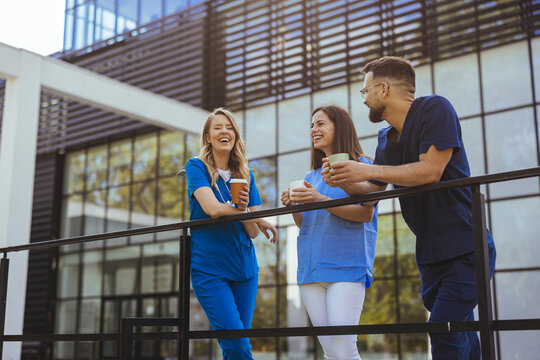 Healthcare Workers Enjoying Coffee Break Outdoors Together
