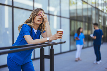 Stressed Healthcare Worker Taking a Break with Coffee Outdoors