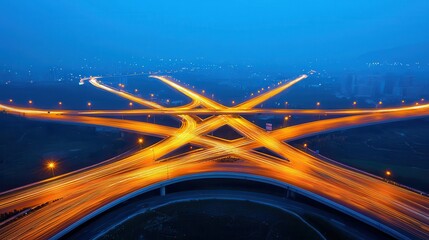 Busy highway intersection with streaks of car lights captured at night, long exposure shot, Dynamic, Photography