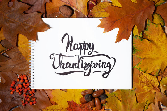 Happy Thanksgiving Greeting Card with Autumn Leaves