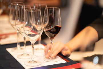 glasses of red wine on table