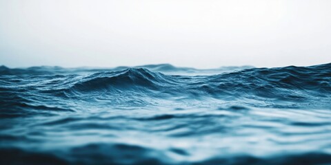 A detailed view of a choppy water surface featuring powerful waves. Perfect choice for nautical themes, oceanic imagery, or abstract backdrops.