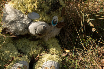 Old dirty plush rabbit toy	