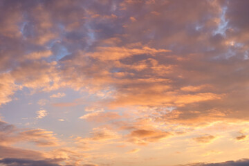 Beautiful sunset sky with pink colors clouds.