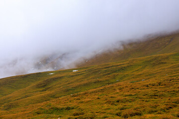 A mysterious atmosphere in the Swiss Alps! An extremely beautiful landscape in the autumn season.