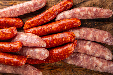 sausage raw meat beef, pork, chicken, lamb, dish fresh  gourmet food background on the table rustic food top view copy space