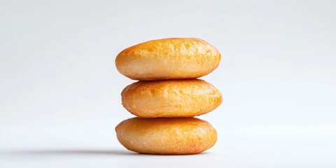 Golden Brown Crispy Crust Bread Bun Set Against a Clean White Backdrop, Showcasing its Delicious Texture and Appetizing Appearance.