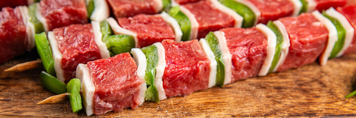 raw meat kebab and vegetable pork, lard, pepper, dish fresh gourmet food background on the table rustic food top view copy space