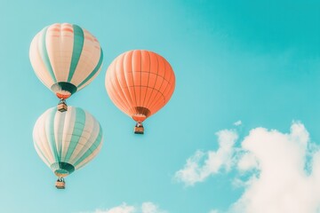 Naklejka premium A set of brightly colored hot air balloons rising into a clear sky. 