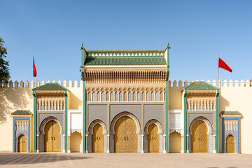 Entrance door with mosaic and brass door at the Royal palace in Fes Morocco