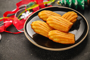 Madeleine, sweet biscuit dessert Christmas cookie delicious Christmas treat Fresh delicious gourmet food background on the table rustic food top view copy space