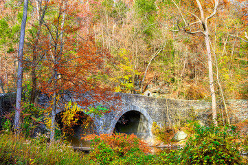 Old bridge in autumn in Philadelphia PA during fall 2024 in Wissahickon Valley Creek Park
