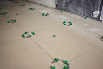 The Comprehensive Tile Installation Process Using Adhesive Techniques and Methods