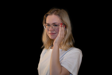 Thoughtful Young Woman with Glasses Touching Face and glasses