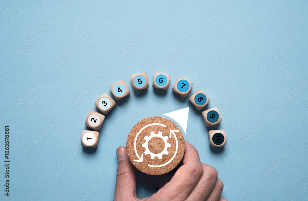 Poster hand turning wooden knob of mechanical gear with measuring level gauge for product and service quali