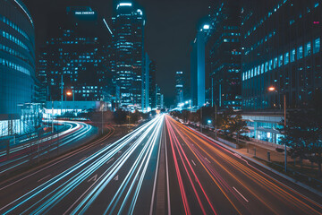 Obraz premium Night scene with city light trails bustling, vibrant urban atmosphere.