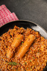 Lentil with sausages tasty food dish second course аresh delicious gourmet food background on the table rustic food top view copy space top view