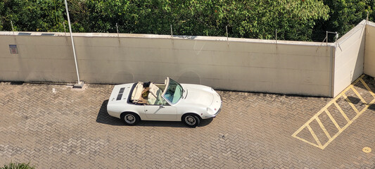 white convertible sports car, seen from above
